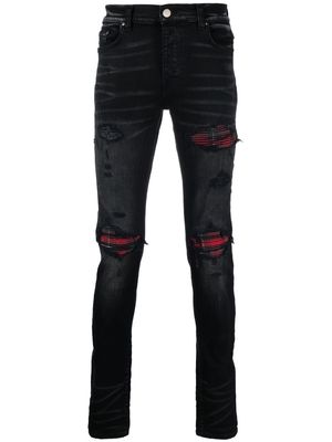 AMIRI distressed slim-cut jeans - Black