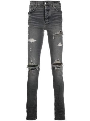 AMIRI distressed slim-fit jeans - Grey