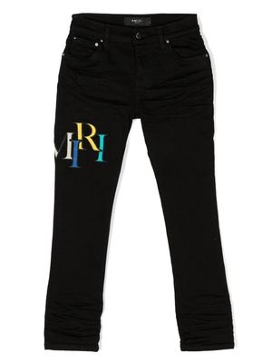 AMIRI KIDS Staggered logo-patches jeans - Black