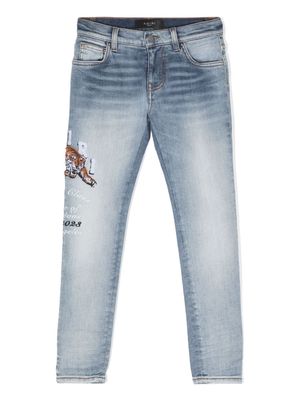 AMIRI KIDS Tiger-embroidered skinny jeans - Blue