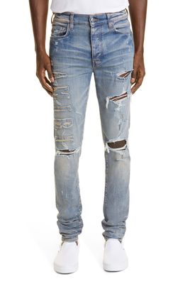 AMIRI Logo Applique Ripped Jeans in Clay Indigo