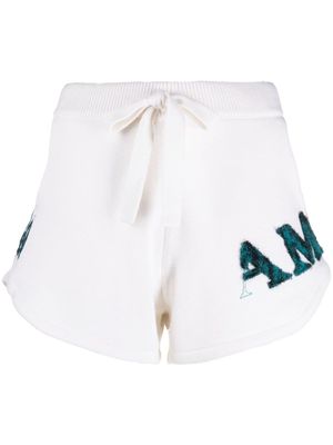 AMIRI logo-embroidered cotton-blend track shorts - White