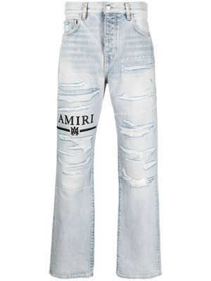 AMIRI logo-embroidery ripped jeans - Blue