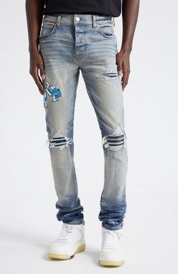AMIRI MX1 Dragon Lunar New Year Ripped & Patched Jeans in Vintage Indigo