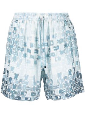AMIRI pattern-logo-printed silk shorts - Blue