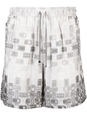 AMIRI pattern-logo-printed silk shorts - Grey