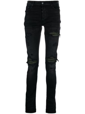 AMIRI ripped skinny-cut jeans - Black