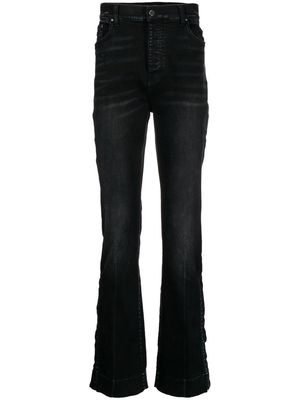 AMIRI Stack distressed-effect flared jeans - Black