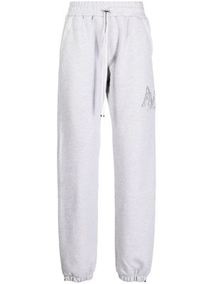 AMIRI Staggered logo-embroidered track pants - Grey