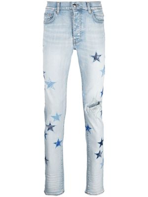 AMIRI star-patch stonewashed jeans - Blue
