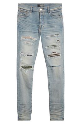 AMIRI Thrasher Ripped Camo Patches Skinny Jeans in Antique Indigo