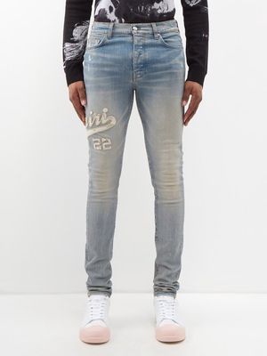 Amiri - Varsity Appliqué Slim-leg Jeans - Mens - Blue