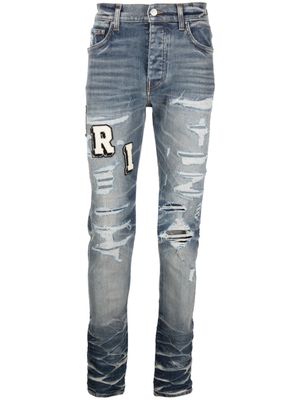 AMIRI Varsity ripped skinny jeans - Blue