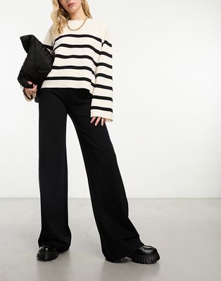 & Other Stories high waist flared pants with clean waistband in black