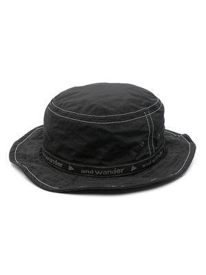 and Wander logo-tape contrast-stitching bucket hat - Black
