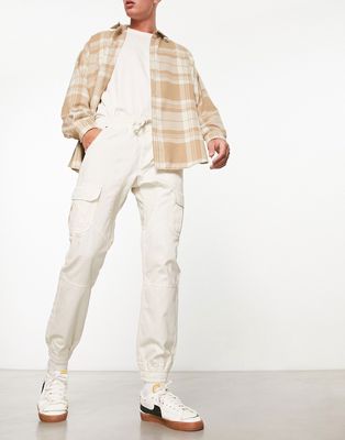 Another Influence cuffed cargo pants in off white