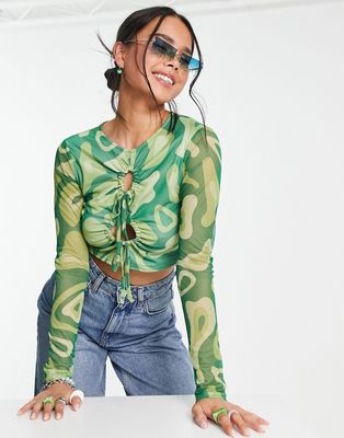 Another Reason cut out mesh crop top in green abstract graphic