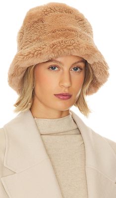 Apparis Gilly Butterscotch Checkerboard Shearling Hat in Tan.