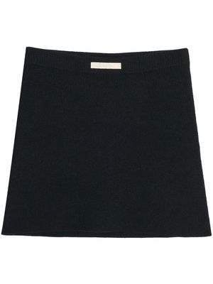 Apparis logo-patch knit mini skirt - Black