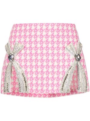 AREA crystal-embellished bow detail miniskirt - Pink