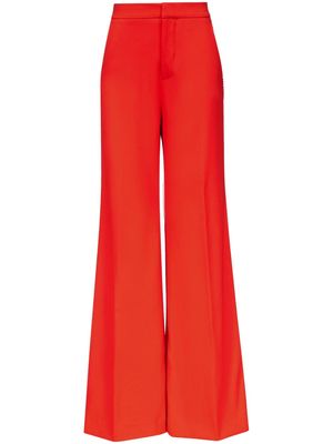 AREA crystal-embellished palazzo trousers - Red