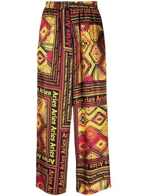 Aries abstract-pattern silk trousers - Black