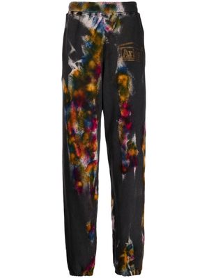 Aries spray-painted cotton track pants - Multicolour