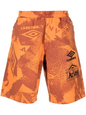 Aries x Umbro graphic-print shorts - Orange