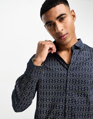 Armani Exchange all over logo long sleeve shirt in navy