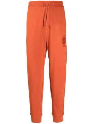 Armani Exchange logo-embroidered track pants - Orange