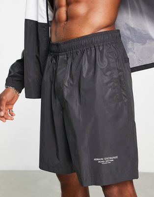Armani Exchange text logo print shorts in black
