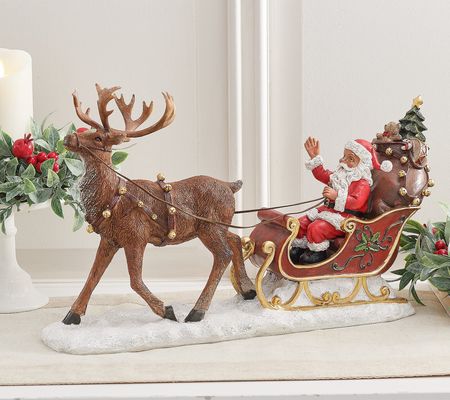 As Is Santa on Sleigh with Reindeerby Valerie