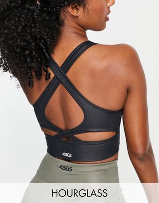 ASOS 4505 Hourglass mid support wet look sports bra with rouch detail in black