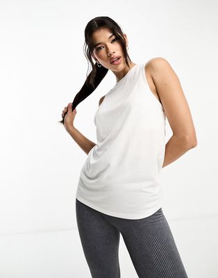 ASOS 4505 yoga tank top with twist back in white