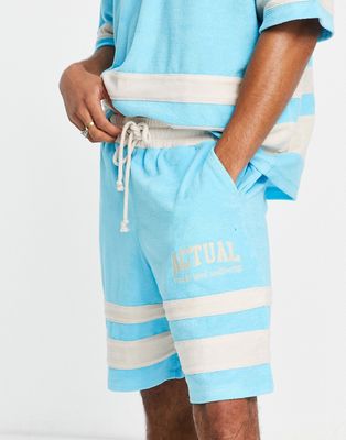 ASOS Actual relaxed shorts with cut and sew detailing and logo print in blue - part of a set