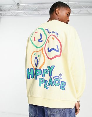 ASOS Daysocial oversized sweatshirt with happy place graphic prints in yellow