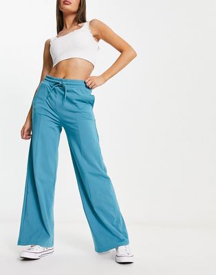 ASOS DESIGN 00s wide leg sweatpants with pintuck in tricot teal-Green