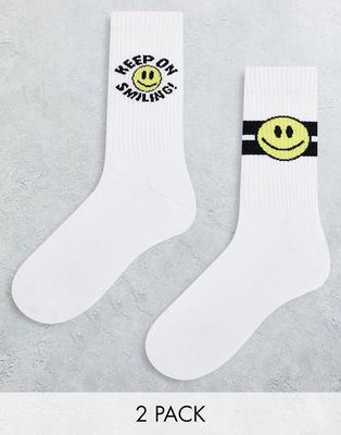 ASOS DESIGN 2 pack sports sock with 'keep on smiling' print in white