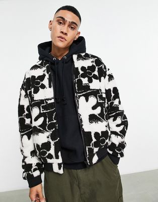 ASOS DESIGN borg walker jacket with floral print in black and white