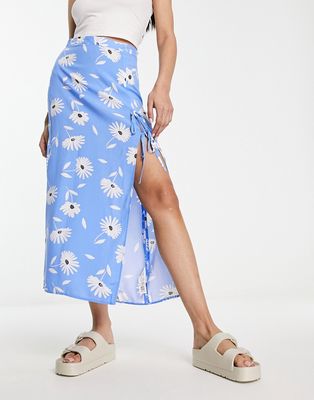 ASOS DESIGN bow detail midi skirt with thigh split in blue daisy print