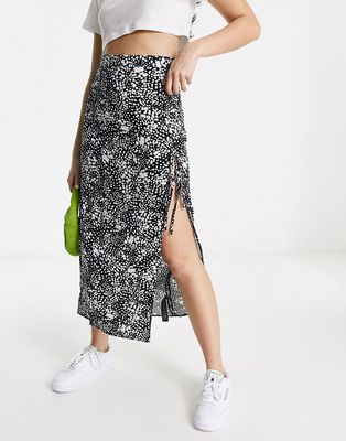 ASOS DESIGN bow detail midi skirt with thigh split in mono smudge print-Multi