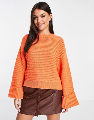 ASOS DESIGN boxy sweater with crew neck in turn back cuff in horizontal rib in orange