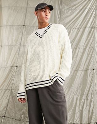 ASOS DESIGN cable knit cricket sweater in off white and navy tipping