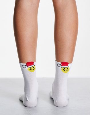 ASOS DESIGN Christmas ankle socks with happy Santa in white
