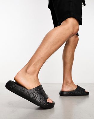 ASOS DESIGN chunky slides with texture in black