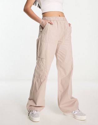 ASOS DESIGN clean pull on cargo pants in stone-Pink
