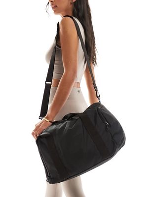 ASOS DESIGN compact luggage bag in black