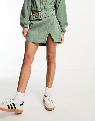 ASOS DESIGN cord wrap mini skirt in sage - part of a set-Green