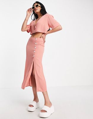 ASOS DESIGN crinkle button side midi skirt in pink - part of a set