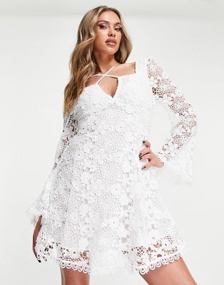 ASOS DESIGN crochet lace cross strap mini dress with flare sleeves in white